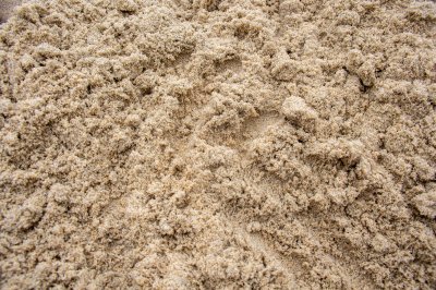 Natural texture de doré sable – gros plan de un africain plage